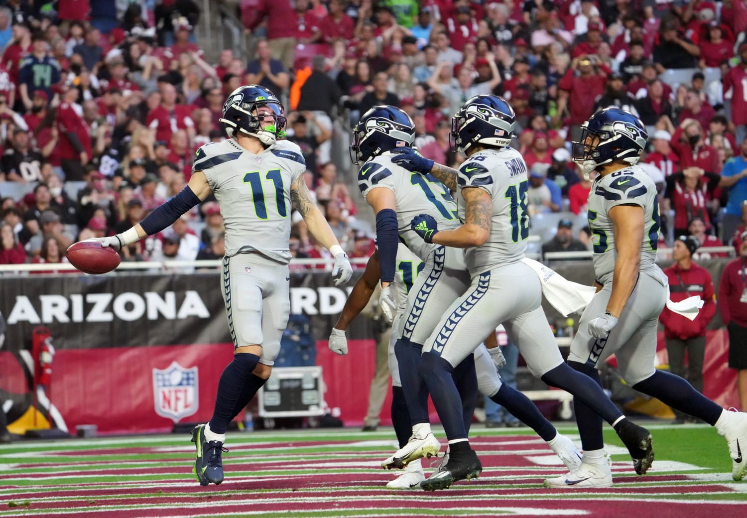 Seattle Seahawks wide receiver Cody Thompson (11) celebrates after recovering a loose ball against the Arizona Cardinals during the second half at State Farm Stadium.